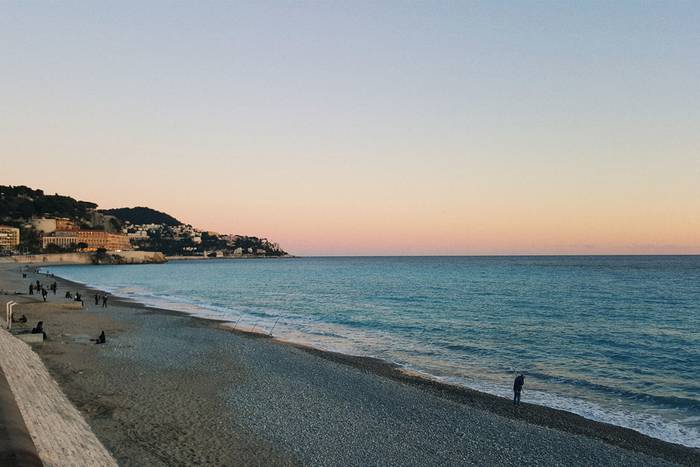 Looking out over the Blue Beach in Nice at sunset