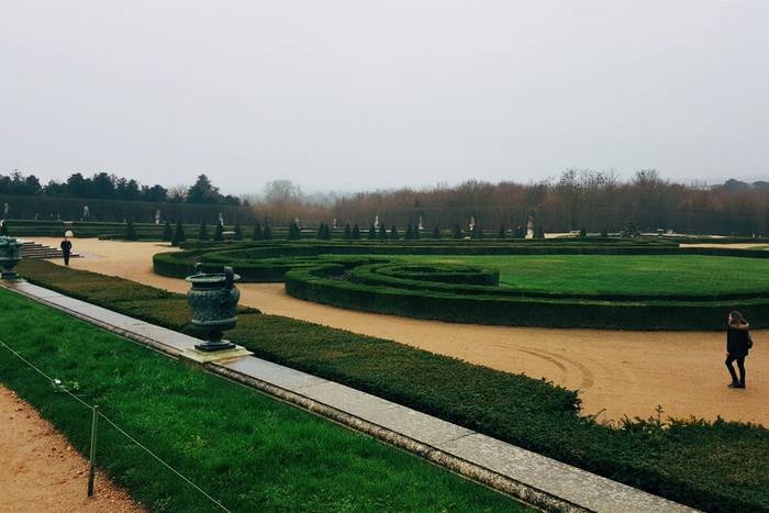 The well groomed gardens at the Palace of Versailles